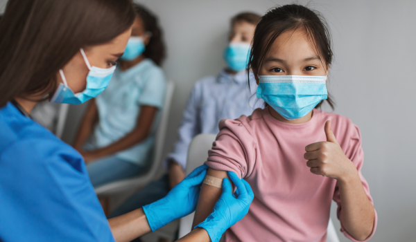 Why Experts Are Criticizing the New COVID Vaccine Guidelines for Healthy Children and Pregnant Individuals