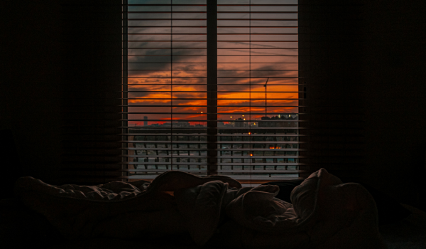 Is It Healthier to Sleep With the Window Open? Here’s What Experts Say